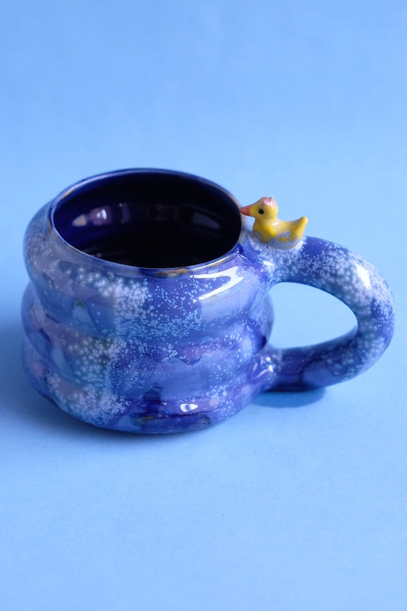 Happy the yellow duckling